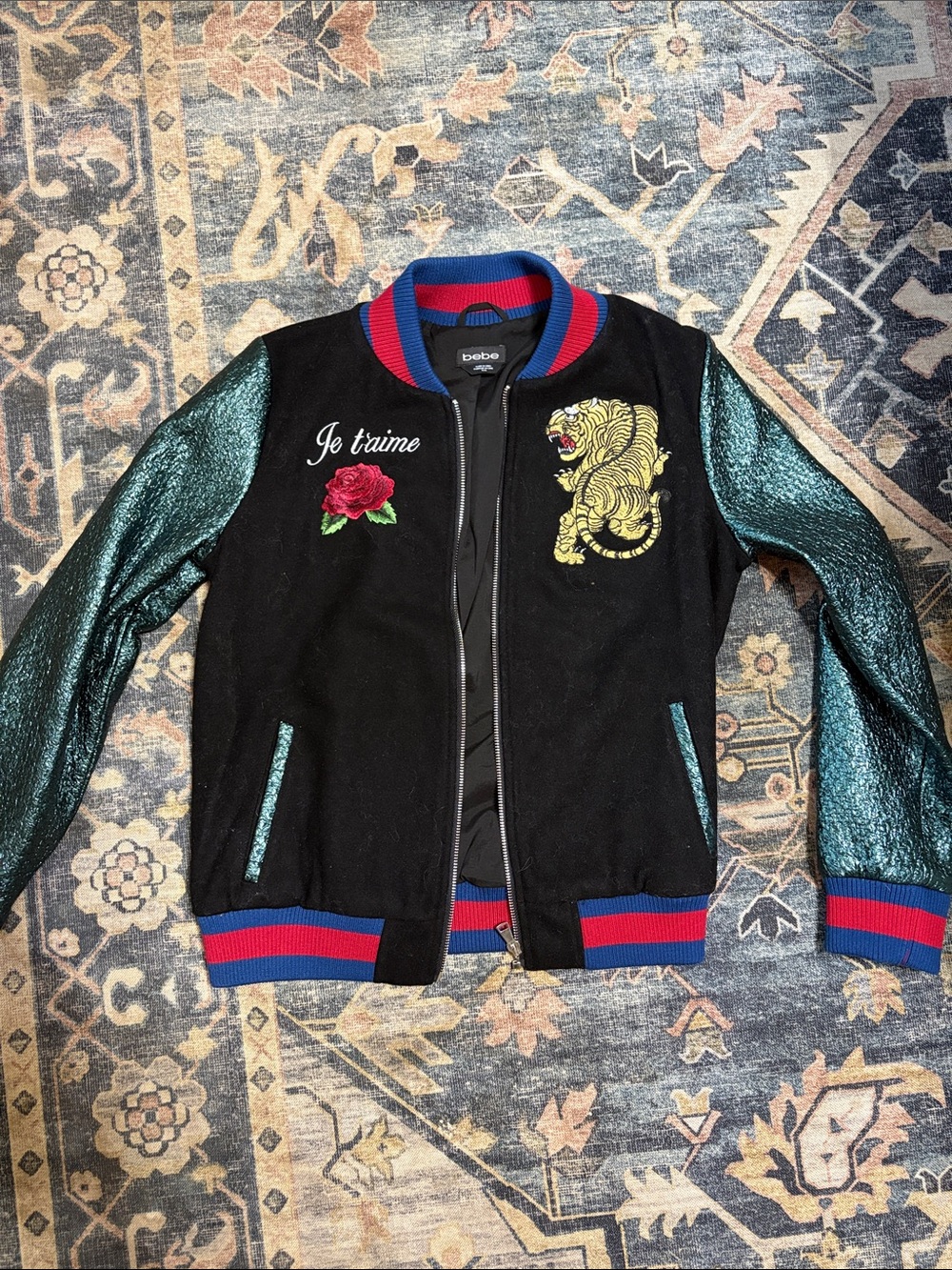 bebe Black Bomber Jacket with Teal Metallic Sleeves and Red-Blue Trim
